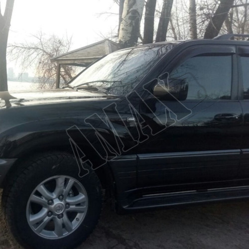 Противотуманки с линзой на Toyota Land Cruiser 100 (в хромовом варианте)