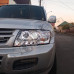 Передние фары с линзой (черные / хром) Митсубиси Паджеро Вагон_Mitsubishi Pajero Wagon 3 (2000-2006)