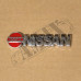 Эмблема Nissan на крыло